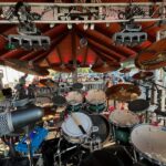 The view from behind the drum kit on stage