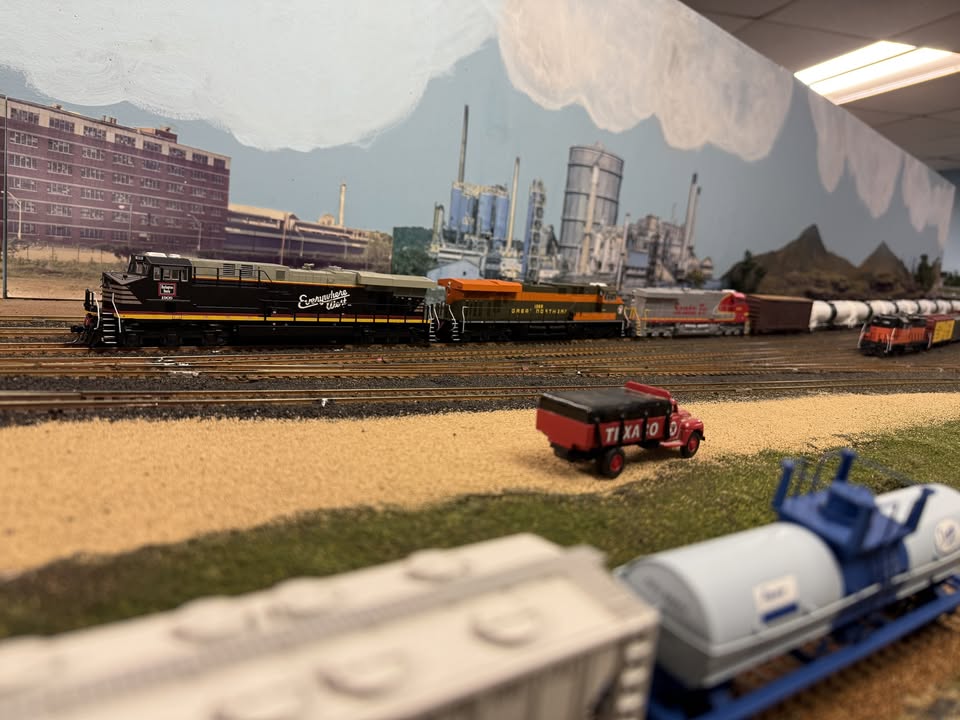 A close up of a model railroad