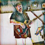 A stylized image of a man playing guitar