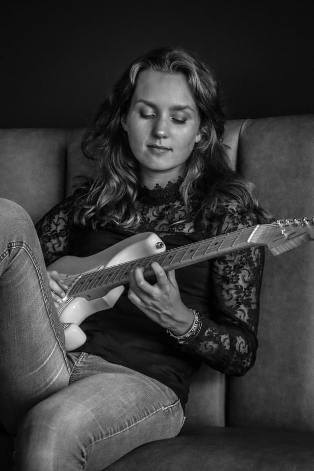 Payton Eilers playing guitar