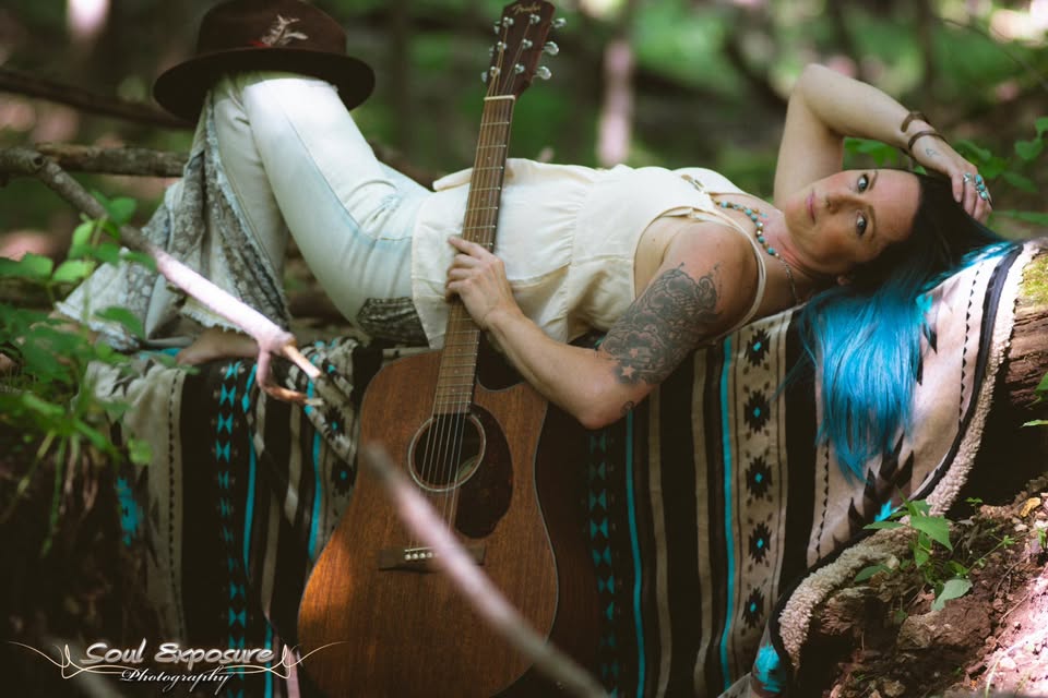 Abbey Lane with her guitar