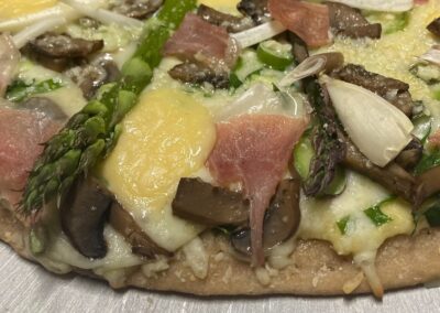 A unique pizza with asparagus
