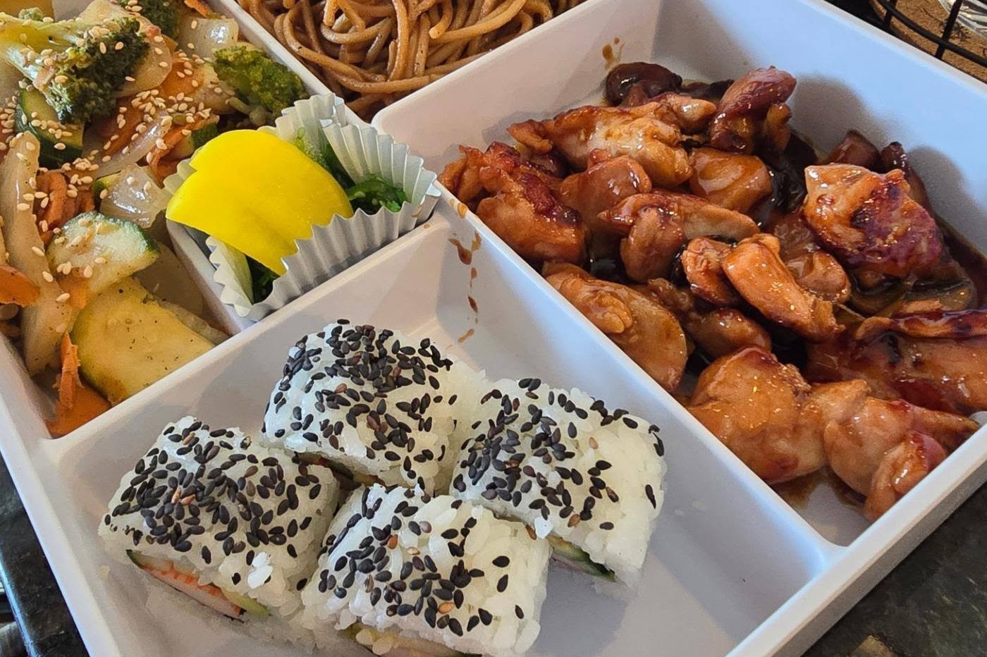 A bento box of Japanese dishes.