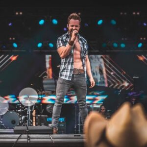 Brent Westgrove singing on stage