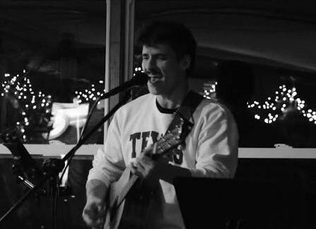 Zeke Fitzmaurice playing aucistic guitar