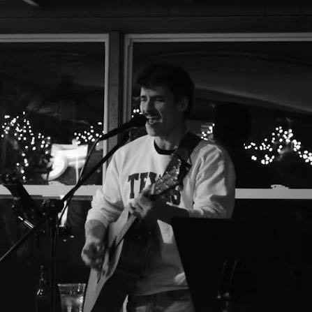 Zeke Fitzmaurice playing aucistic guitar