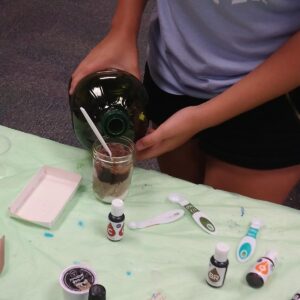 A picture of a person making a sugar scrub.