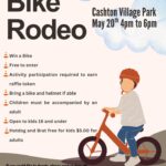 A poster with the event information on it and a child riding a bike.