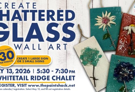 A poster with the event information also showing shattered glass wall art.