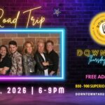 A poster with the event information on it along with a picture of the band Road Trip on it.