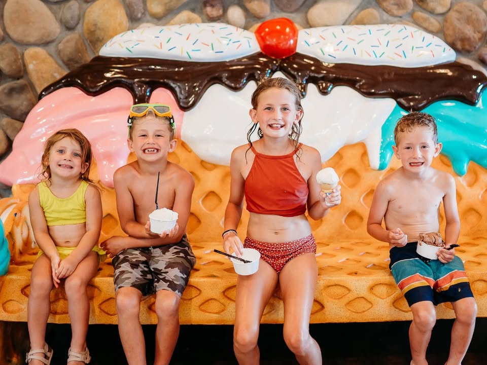 children sitting on A waffle corn shape seat.