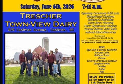 A poster with the event information on it along with a photo of a group of people standing in front of a dairy farm.