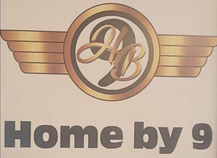 Home by 9 logo