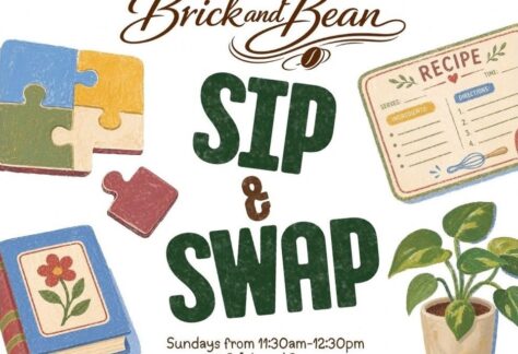 A poster with puzzle pieces, recipe card, book, and potted plant on it.
