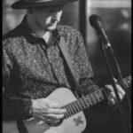 Duncan Peterson playing the guitar