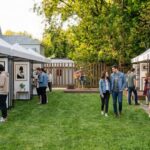 Two rows of tents with art for sale