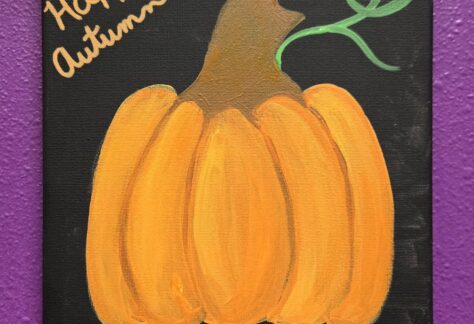 a canvas painting of a simple pumpkin