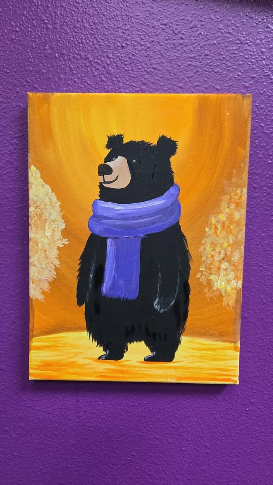 A canvas painting of a bear in a scarf