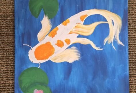 A canvas painting of a koi fish