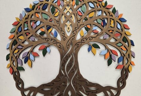 A painted wooden tree of life